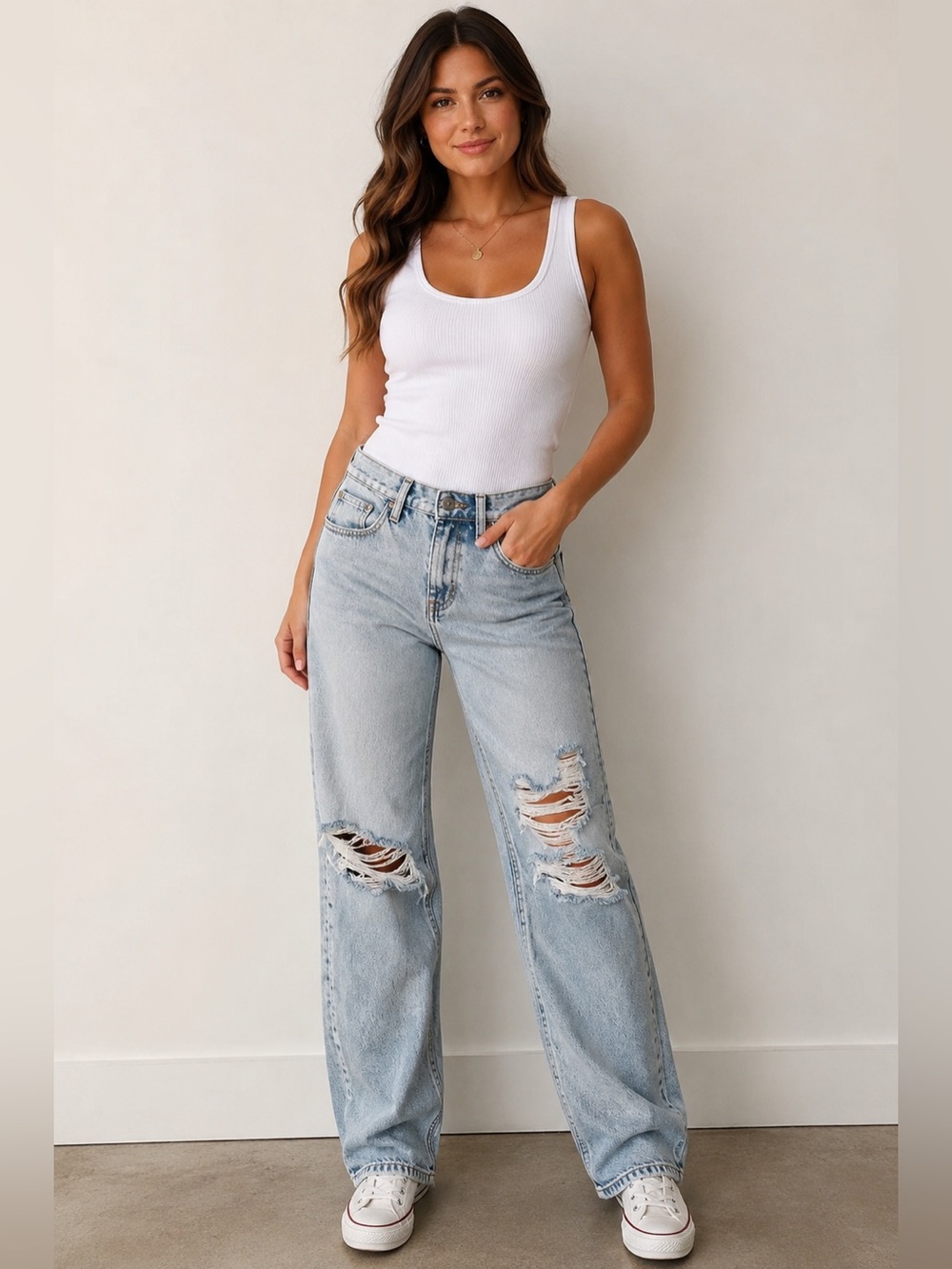 We The Free Light Wash Distressed Jeans